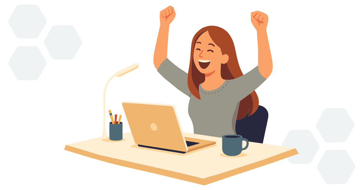 Person celebrating at a desk with a laptop